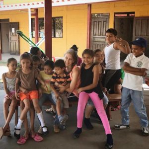Katie hanging out with some of the children at Taellor's House